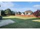 Spacious backyard featuring a well-maintained lawn and privacy fence at 508 Arbor Trl, Loganville, GA 30052