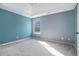 Large bedroom with recessed lighting, a tray ceiling, and plush carpet at 508 Arbor Trl, Loganville, GA 30052
