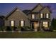 Charming two-story brick home featuring well-maintained landscaping and traditional architectural details at 508 Arbor Trl, Loganville, GA 30052