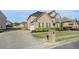 Side view of a two-story house with brick mailbox and a concrete driveway at 508 Arbor Trl, Loganville, GA 30052