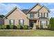 Charming two-story brick home featuring well-maintained landscaping and traditional architectural details at 508 Arbor Trl, Loganville, GA 30052