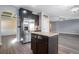 A modern kitchen featuring an island and stainless steel refrigerator at 508 Arbor Trl, Loganville, GA 30052
