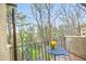 Balcony features outdoor furniture and a view of green trees at 810 Lismore Se # 10, Smyrna, GA 30080