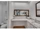 Elegant bathroom featuring granite countertops, dual sinks, and a large mirror with great light at 810 Lismore Se # 10, Smyrna, GA 30080