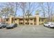 View of condo exterior and parking lot at 810 Lismore Se # 10, Smyrna, GA 30080