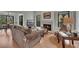 Cozy living room with a fireplace, plush seating, and natural light from windows at 810 Lismore Se # 10, Smyrna, GA 30080
