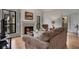 Comfortable living room with fireplace, wood floors and outside view at 810 Lismore Se # 10, Smyrna, GA 30080
