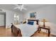 Inviting main bedroom offering a peaceful ambiance with soft lighting, and dark wood furniture at 810 Lismore Se # 10, Smyrna, GA 30080
