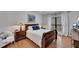 Comfortable main bedroom with a large bed, plush pillows, and bright windows for a serene retreat at 810 Lismore Se # 10, Smyrna, GA 30080