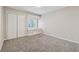 Bedroom featuring a window seat and double-door closet at 1870 Abercorn Way, Snellville, GA 30078