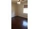 This bedroom features a ceiling fan and hardwood floors at 2213 Sharon Way, Decatur, GA 30032