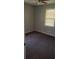 This bedroom has a ceiling fan and light-filtering blinds at 2213 Sharon Way, Decatur, GA 30032