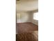 Carpeted living area that offers an open space with natural light from the window at 2213 Sharon Way, Decatur, GA 30032