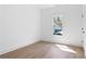 An empty bedroom providing a blank canvas with great natural light and wood laminate flooring at 1249 Ladd Sw St, Atlanta, GA 30310