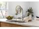 Close-up of a modern kitchen sink with quartz countertops, designer faucet, and stainless steel sink at 1249 Ladd Sw St, Atlanta, GA 30310