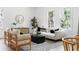 Inviting living room featuring abundant natural light, stylish furniture, and sophisticated decor at 1249 Ladd Sw St, Atlanta, GA 30310