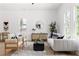 Bright living room offering a comfortable seating area, a modern coffee table, and tasteful decorations at 1249 Ladd Sw St, Atlanta, GA 30310