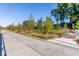 Scenic walking path surrounded by trees and greenery, inviting residents to embrace an active outdoor lifestyle at 1249 Ladd Sw St, Atlanta, GA 30310