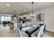Bright and airy dining room open to the kitchen and living room at 1260 Ainsworth Aly # 47, Sugar Hill, GA 30518