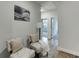 Cozy hallway with decor, leading to bedroom and featuring hard wood floors at 1260 Ainsworth Aly # 47, Sugar Hill, GA 30518