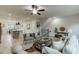 Open-concept living room with neutral tones and hardwood flooring at 1260 Ainsworth Aly # 47, Sugar Hill, GA 30518