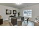 Bright office space features modern décor, a large window, and hardwood floors at 1260 Ainsworth Aly # 47, Sugar Hill, GA 30518