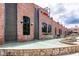 Modern building exterior featuring sleek design and a serene water feature that enhances the building's aesthetic appeal at 1260 Ainsworth Aly # 47, Sugar Hill, GA 30518