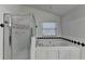 A bathroom featuring a jetted tub and a separate shower at 1824 Kristen Ct, Suwanee, GA 30024