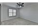 Bedroom featuring a ceiling fan, and natural light coming from a window at 1824 Kristen Ct, Suwanee, GA 30024