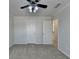 Bedroom with natural light, ceiling fan, and easy access to the hallway at 1824 Kristen Ct, Suwanee, GA 30024