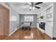 Inviting dining room with hardwood floors, a brick fireplace, and built-in shelving at 4444 Casco Nw Ln, Lilburn, GA 30047