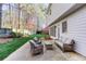 Cozy backyard patio with comfortable seating, perfect for outdoor relaxation at 2516 Woolwich Nw Ct, Acworth, GA 30101