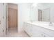 Bright bathroom featuring a shower and large vanity at 2516 Woolwich Nw Ct, Acworth, GA 30101