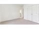 Bedroom featuring neutral carpet and attached bathroom at 2516 Woolwich Nw Ct, Acworth, GA 30101