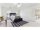 Inviting bedroom features neutral decor, with carpet, and access to the hallway at 2516 Woolwich Nw Ct, Acworth, GA 30101