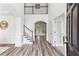 Bright foyer with staircase, hardwood floors, and an open design at 2516 Woolwich Nw Ct, Acworth, GA 30101