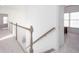 Upstairs hallway with neutral walls, carpet and access to rooms at 2516 Woolwich Nw Ct, Acworth, GA 30101
