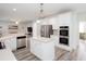 Modern kitchen with stainless steel appliances and large center island at 2516 Woolwich Nw Ct, Acworth, GA 30101