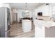 Bright eat-in kitchen with stainless refrigerator and ample cabinet space at 2516 Woolwich Nw Ct, Acworth, GA 30101