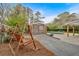 Backyard showcasing swing, pool, lounge chairs, and brick storage area at 2520 Robin Hood Ne Pl, Marietta, GA 30068