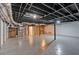 Spacious unfinished basement with exposed ceiling, offering potential for customization and expansion at 2520 Robin Hood Ne Pl, Marietta, GA 30068