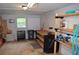 Finished basement area offering shelving, workbench and storage, perfect for hobbies or workshop at 2520 Robin Hood Ne Pl, Marietta, GA 30068