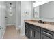 Stylish bathroom featuring modern vanity with granite counters and fixtures, and tile floors at 2520 Robin Hood Ne Pl, Marietta, GA 30068