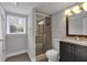 Bathroom with sink and shower with glass door at 2520 Robin Hood Ne Pl, Marietta, GA 30068