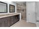 Bright bathroom featuring a shower and double sink at 2520 Robin Hood Ne Pl, Marietta, GA 30068