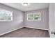 Bedroom with a window and neutral walls and carpet at 2520 Robin Hood Ne Pl, Marietta, GA 30068