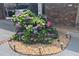Charming garden bed with colorful hydrangea bush nestled next to a brick home at 2520 Robin Hood Ne Pl, Marietta, GA 30068