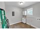 Functional laundry room with tiled floors, a sink, storage cabinets, and modern appliances at 2520 Robin Hood Ne Pl, Marietta, GA 30068