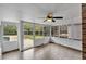 Cozy sunroom with tile flooring and views of the outdoor patio and pool at 2520 Robin Hood Ne Pl, Marietta, GA 30068
