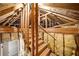 Insulated attic showing wood frame construction with access door at 978 Moores Club Ne, Atlanta, GA 30319